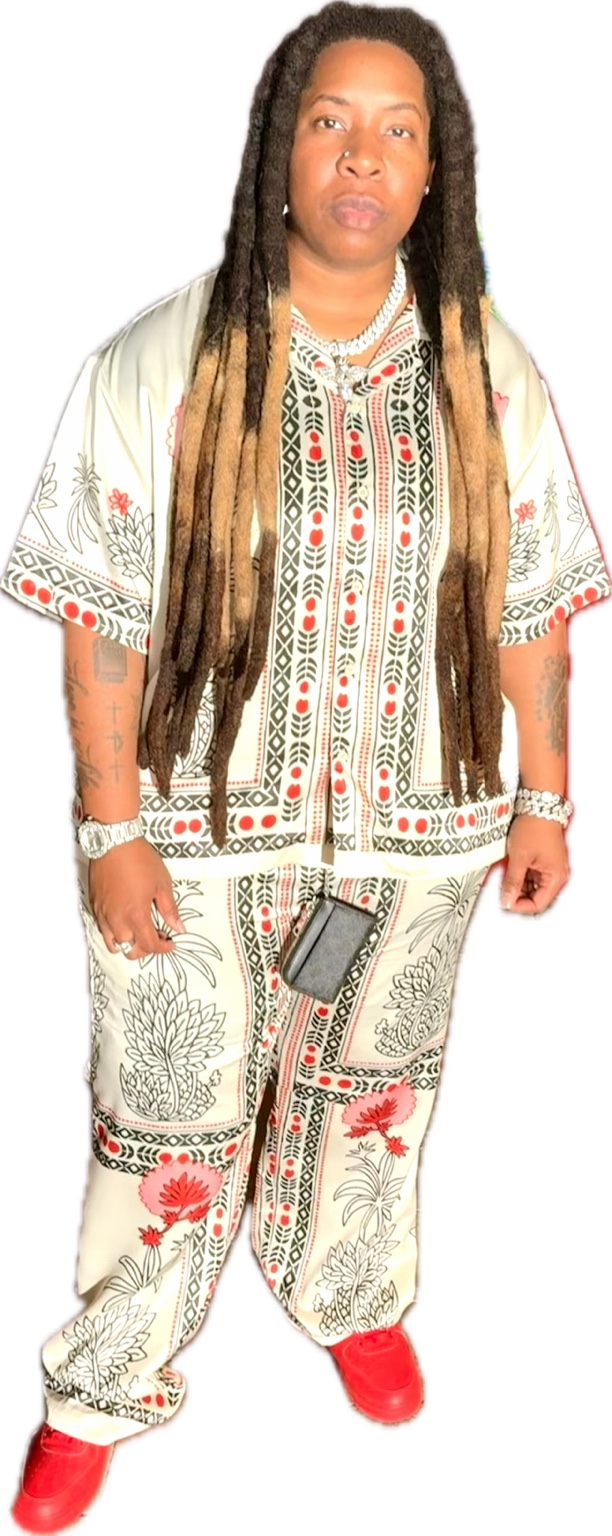 Taylor Vanae in a patterned cream outfit